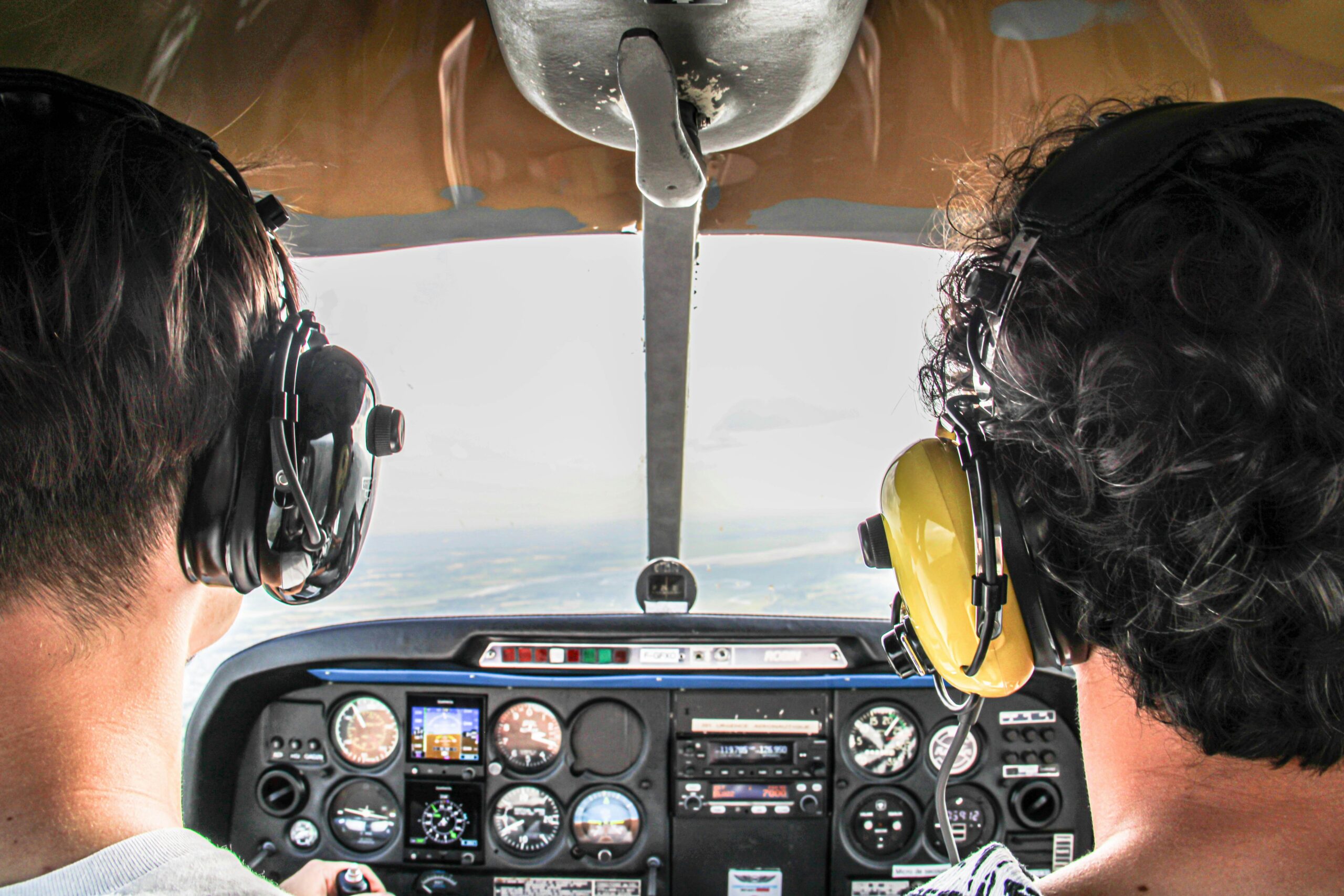 While the financial investment is significant, becoming a professional pilot opens the door to a rewarding career in the skies. [Credit: Unsplash]